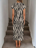 Image 11 - angle view of Elegant Navy Blue Striped Midi Dress for Women - Casual Nautical Style with High Slit and Twist Waist