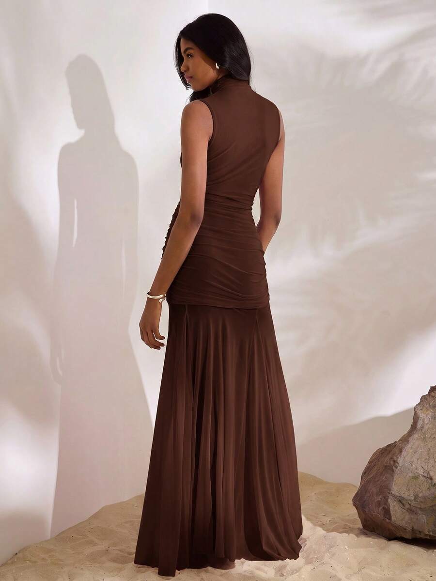 Brown sleeveless mock neck mermaid dress side view