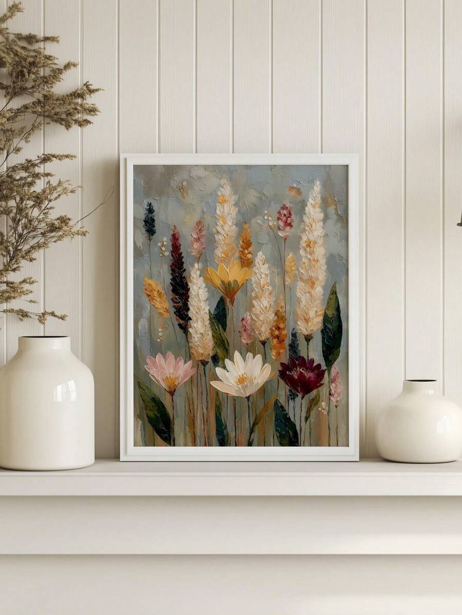 Vintage wildflower canvas wall art in a light wood frame leaning against a paneled wall