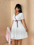 Plus size surplice V neck fit and flare summer dress variant image 25