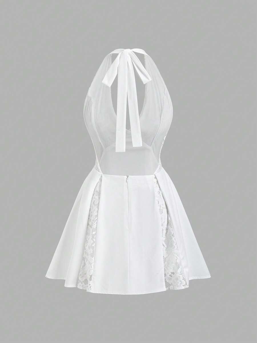 Front view of backless lace mini dress for elegant party moments