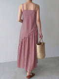 Red and white striped maxi dress showing diagonal bodice seam