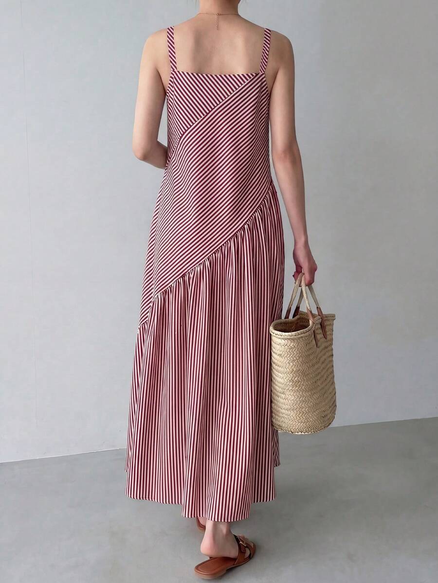 Red and white striped maxi dress showing diagonal bodice seam