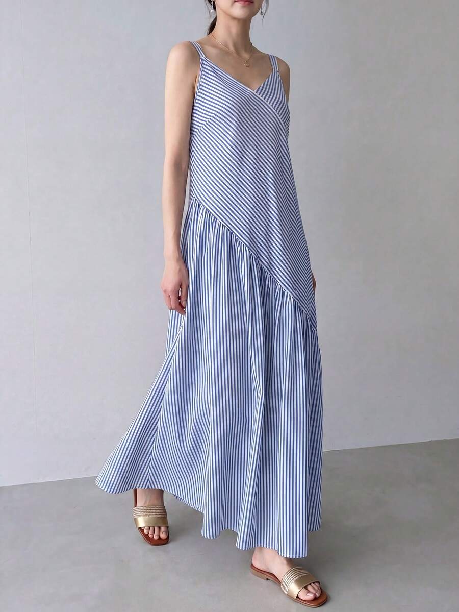 Blue and white striped dress side view with gathered skirt