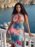 Close-up view of plus size tropical print maxi dress - sleeveless halter tie front for boho beach vacations and summer weddings with maxi dress silhouette, tropical print, plus size fit for summer casual wear