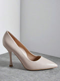 Side product view of blush pointed-toe strapless stiletto court pumps with smooth finish and flared high heel
