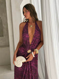 Close front view of purple printed halter maxi dress with ruched shell waist