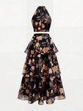 Front view of salmon botanical crop top and layered maxi skirt set