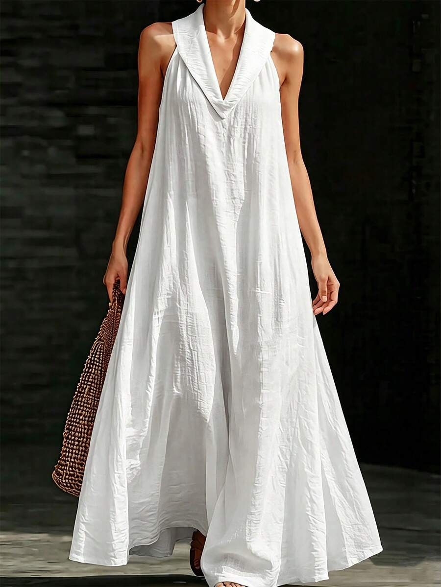 Front view of white crinkle texture maxi dress with deep V lapel collar