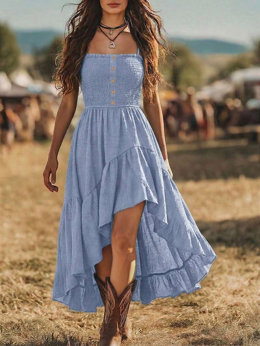 Light blue boho high low dress front view with spaghetti straps and boots