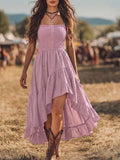 Pink high low boho dress front view with smocked bodice and ruffle skirt