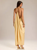 Yellow halter satin maxi dress view 1