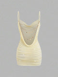 Cadet blue backless mini dress with spaghetti straps and bodycon shape