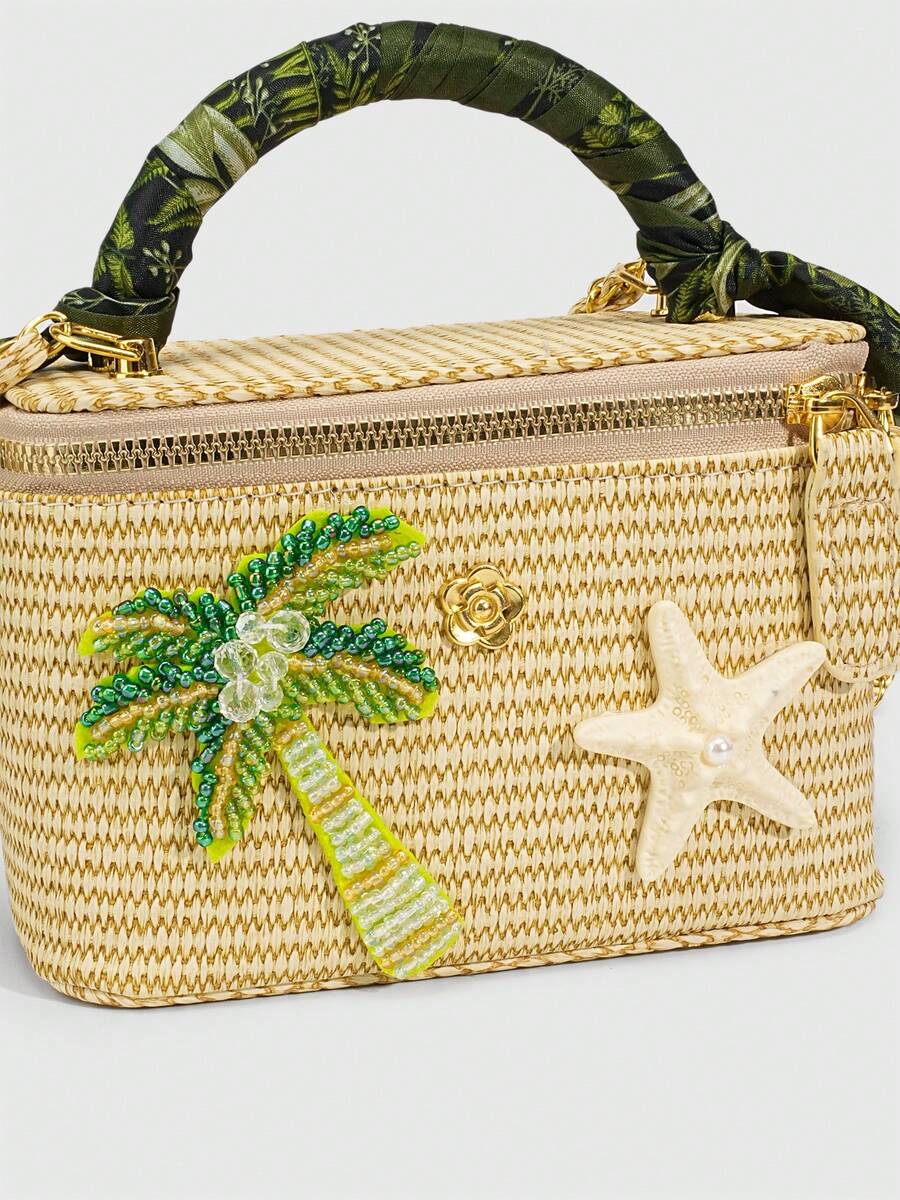 Side view of straw box crossbody bag with gold hardware and chain strap