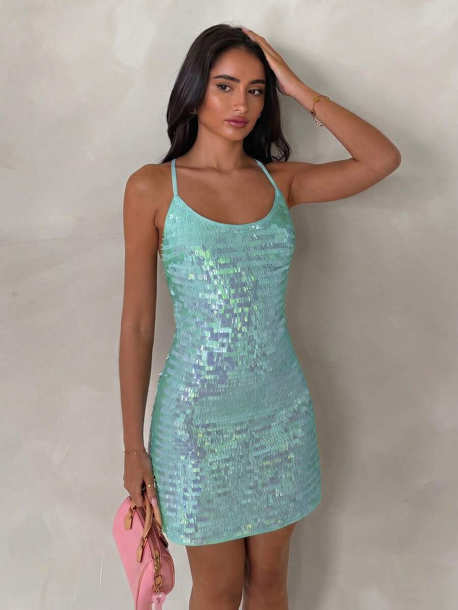 open back sequin cami mini dress with scoop neckline, spaghetti straps, crisscross tie back, fitted bodice, slight A-line mini skirt, iridescent sequin variants and orange floral print variant image 11