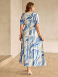 Shop a blue and white polka dot linen maxi dress for women. Perfect for French-inspired summer style, vacations, brunch, beach days, and casual outings.