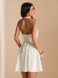 Ivory corset-back mini dress rear view
