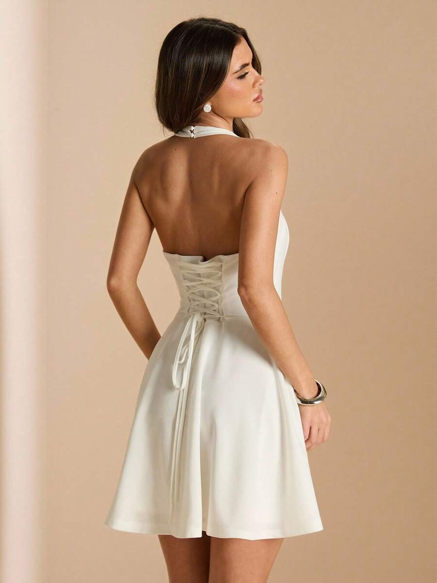 Ivory corset-back mini dress rear view