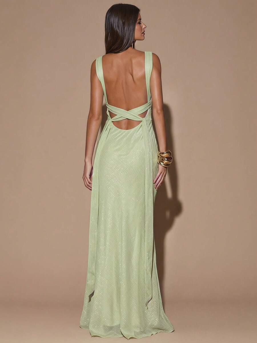 Back view of ivory sleeveless deep V-neck maxi dress with crossed open back, shown for wedding and evening wear