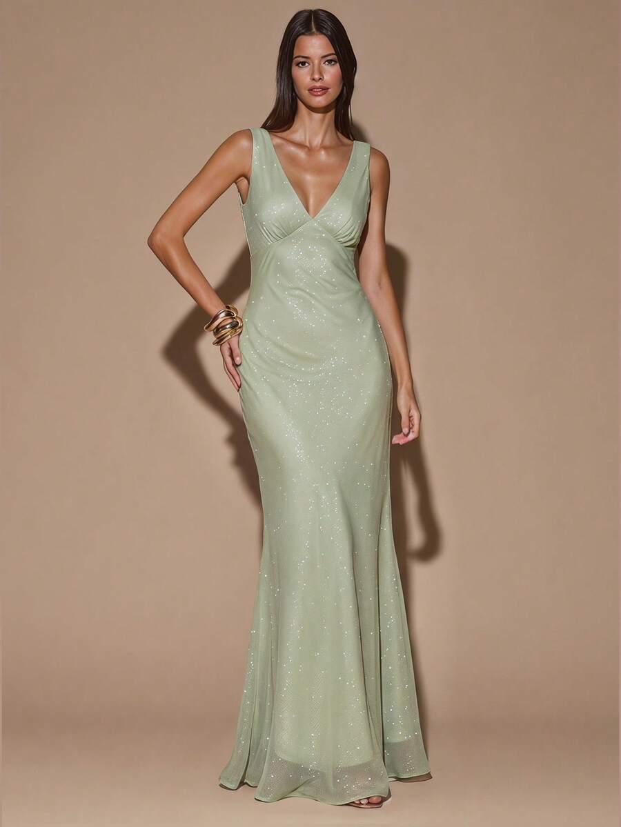 Front view of ivory sleeveless deep V-neck maxi dress with crossed open back, shown for wedding and evening wear