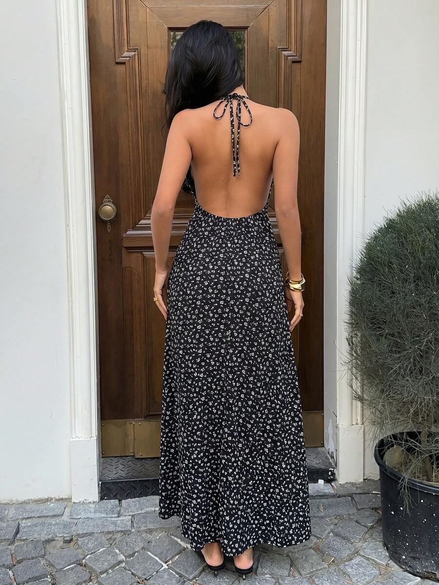 Capture effortless elegance with this blue plaid halter maxi dress, designed to blend classic charm with modern sophistication.