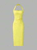 Back view bright yellow halter midi dress