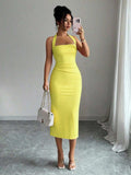 Bright yellow halter bodycon midi dress front view