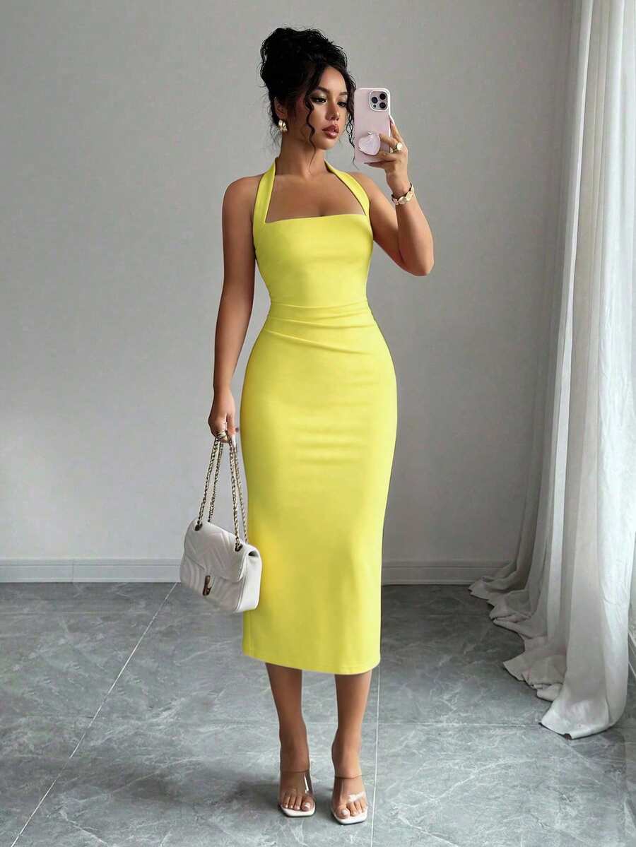 Bright yellow halter bodycon midi dress front view