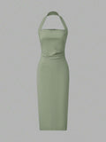 Back view sage green halter midi dress