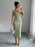 Sage green halter bodycon midi dress front view