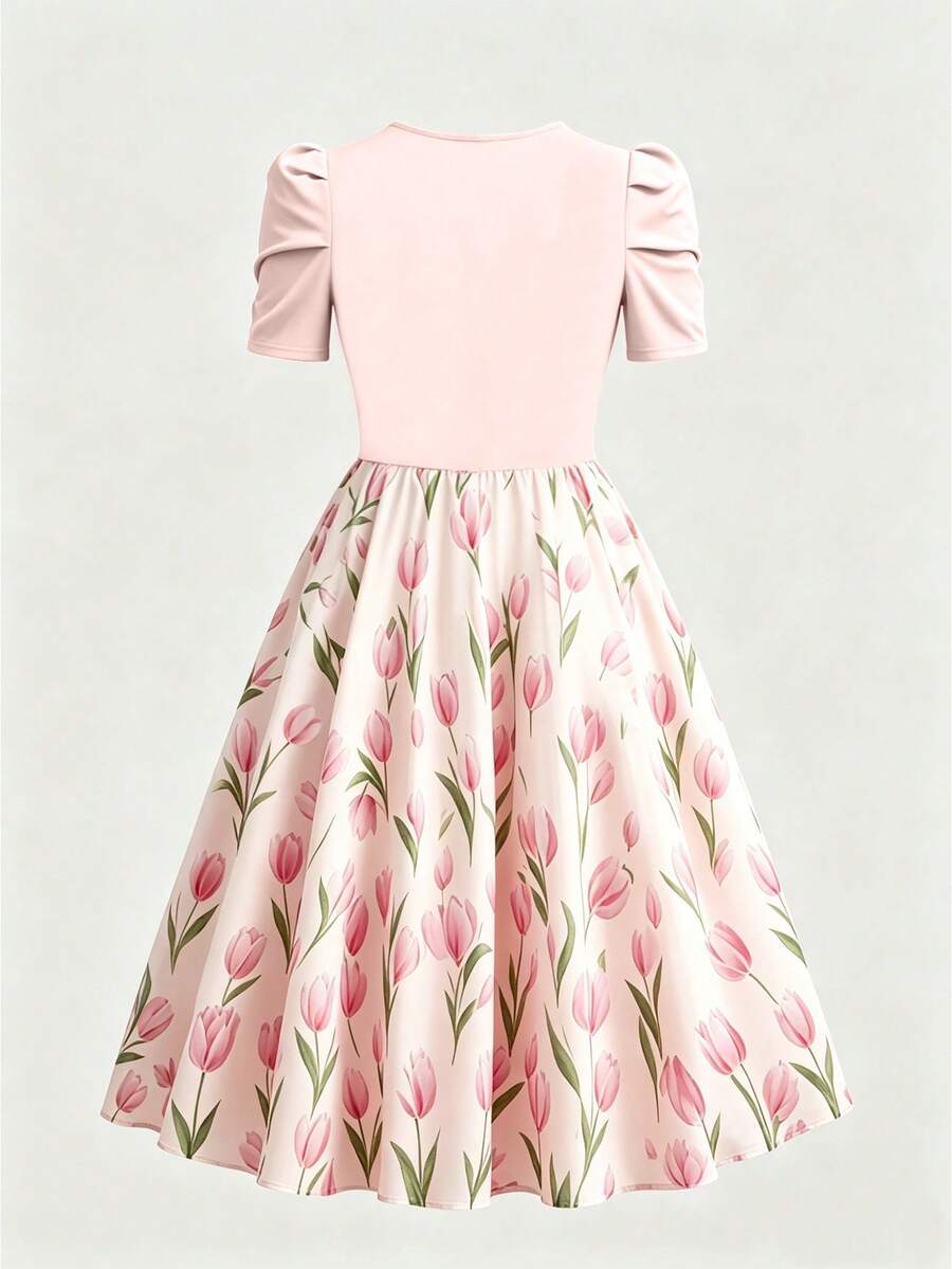 Pink puff-sleeve fit-and-flare dress with tulip print skirt front view