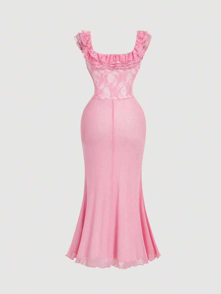 Model wearing blush pink mermaid maxi dress with ruched straps beside roses