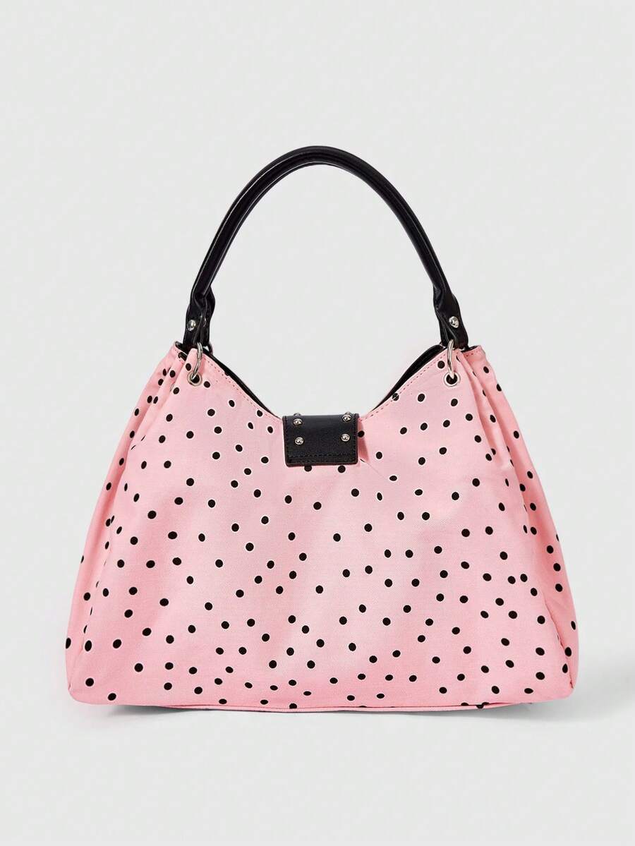 Angled view of black patterned punk shoulder bag with double handles