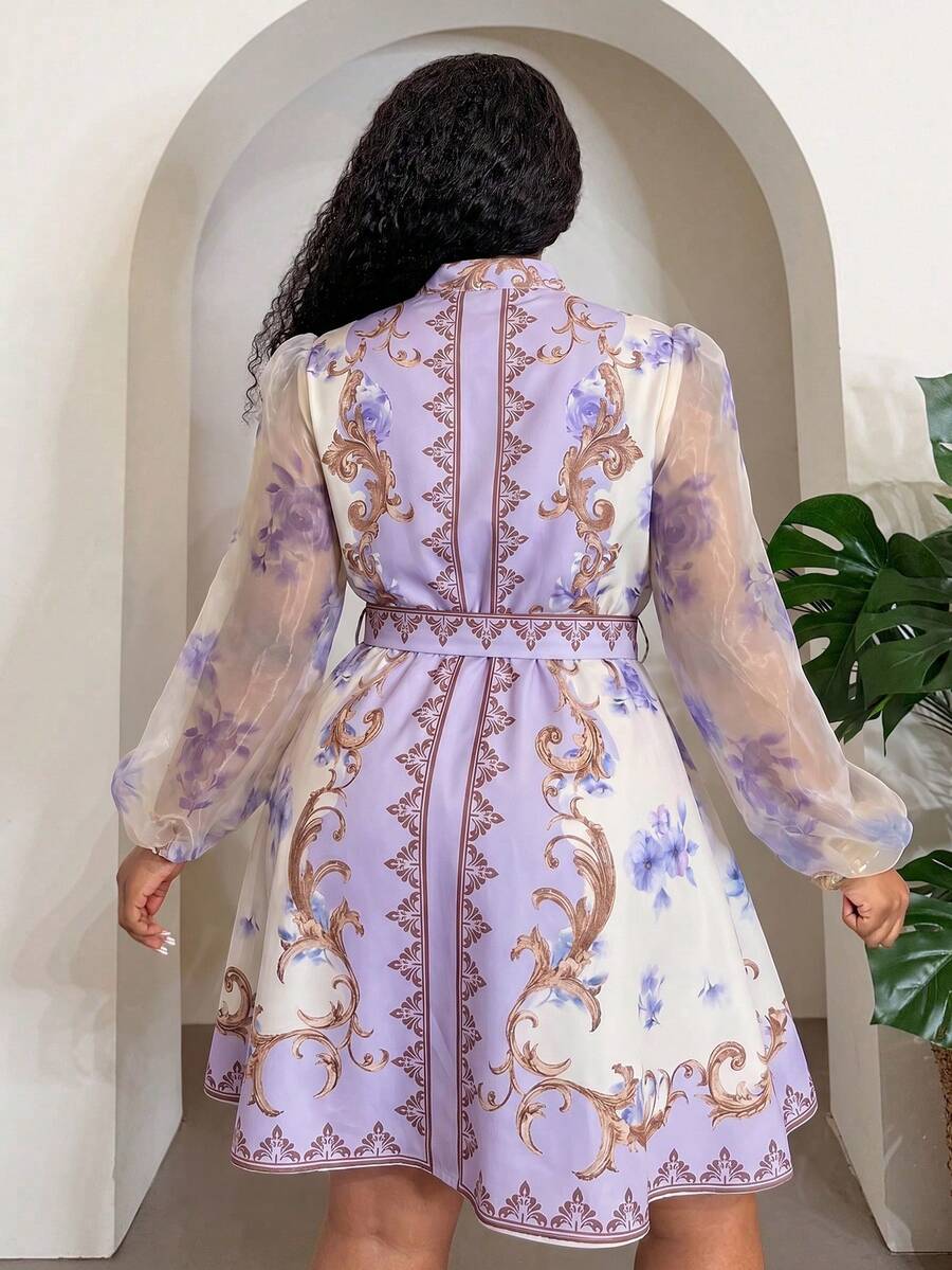 Back view of Elegant Floral Plus Size Mini Shirt Dress for Beach Vacations and Special Occasions Mauve Purple flared hem fit