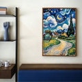 Modern room view of framed Van Gogh style blue village landscape print above bench
