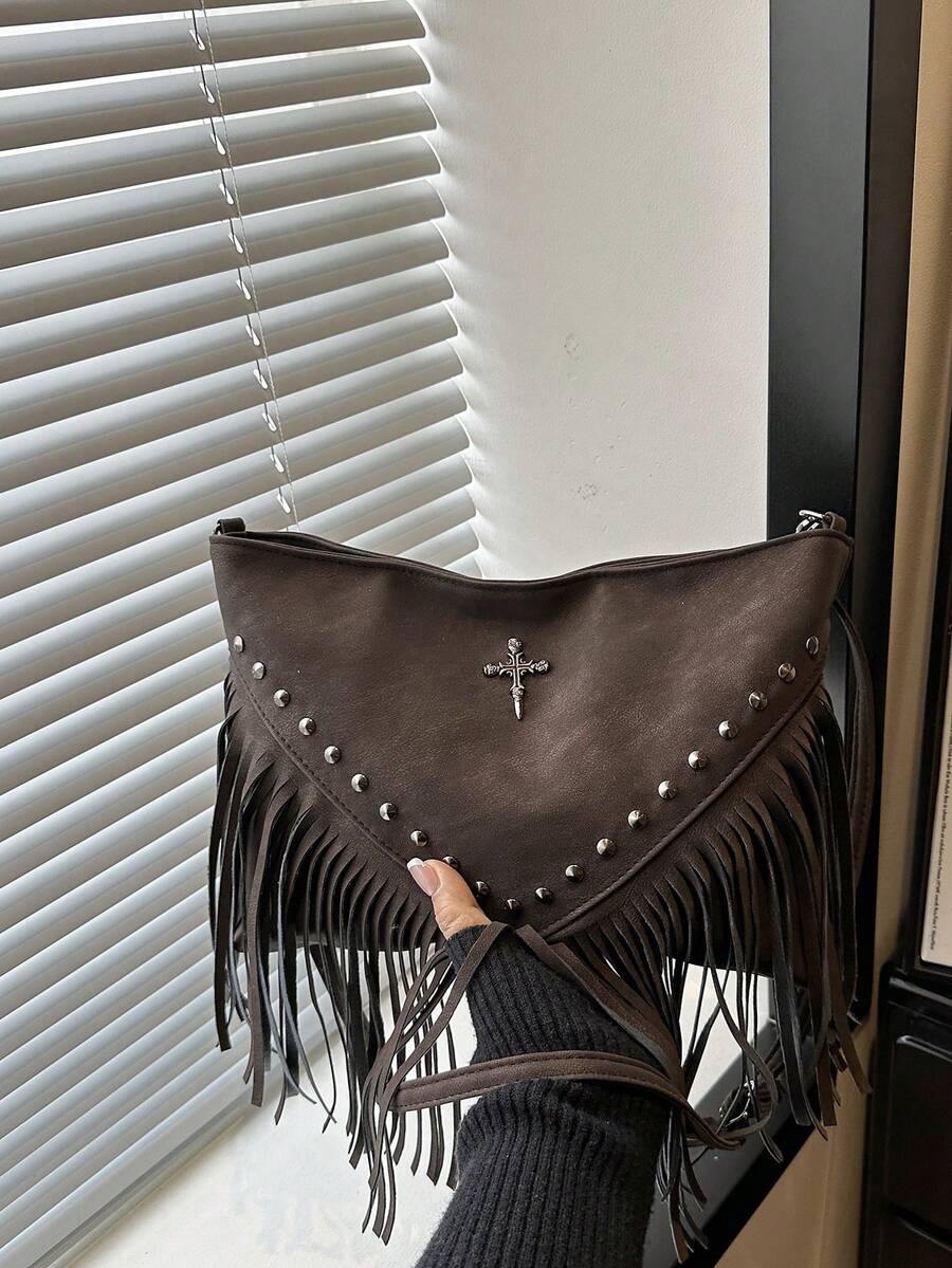 Image 1 - front view of Chic Vintage Leather Crossbody Bag with Boho Style and Decorative Tassels for Everyday Travel