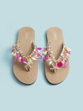 Top-down view of multicolor starfish beach sandals with shell and bead accents