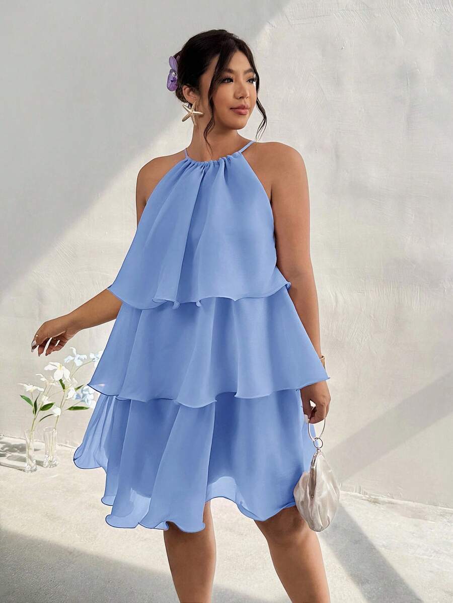 Front view of periwinkle blue tiered halter dress