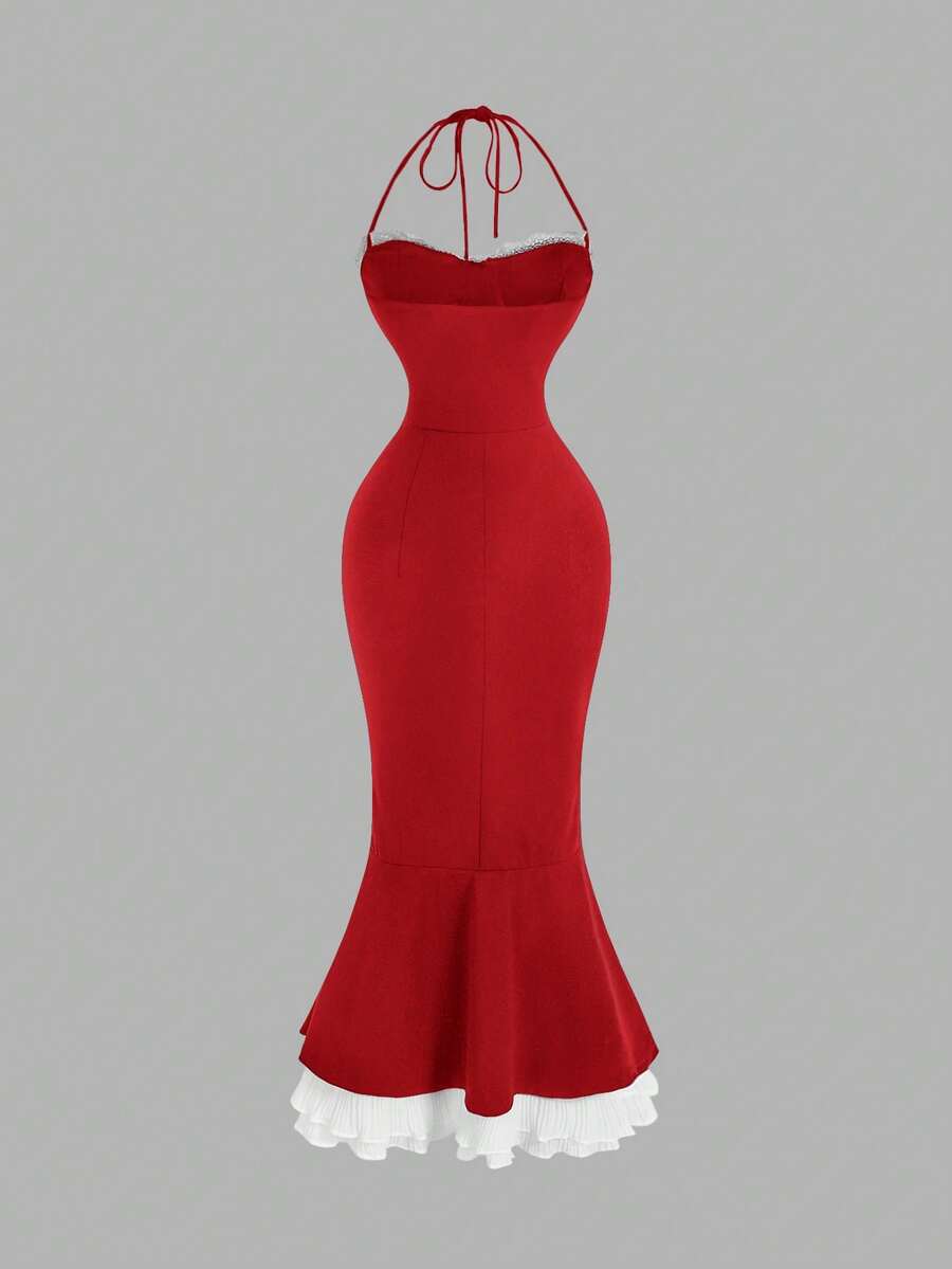 Back view of red halter mermaid midi dress with white ruffle hem
