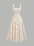 Back view of cream floral smocked maxi dress