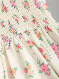 Close-up of cream floral fabric and lace trim