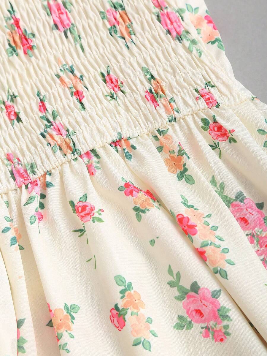 Close-up of cream floral fabric and lace trim