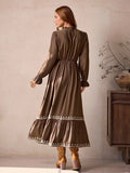 Front view of vintage bohemian brown maxi dress with frill trim and embroidered hem for autumn/winter with maxi dress silhouette for daily wear