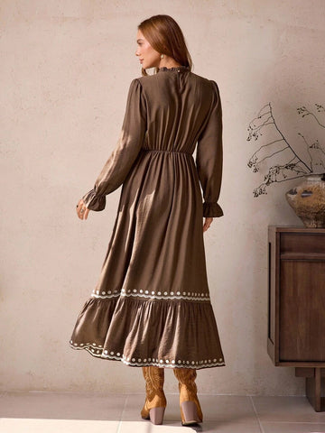 Front view of vintage bohemian brown maxi dress with frill trim and embroidered hem for autumn/winter with maxi dress silhouette for daily wear