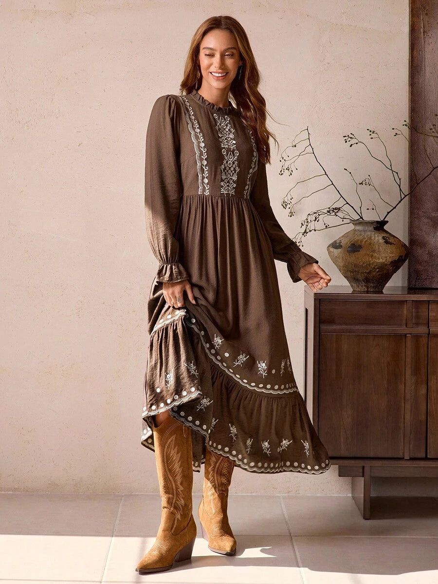 Front view of vintage bohemian brown maxi dress with frill trim and embroidered hem for autumn/winter with maxi dress silhouette for daily wear