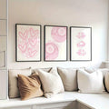Close-up of pink 8-ball heart themed wall art