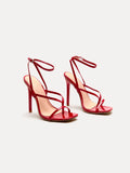 Side view of Stylish Silver Stiletto Heels for Women: Trendy High Heel Sandals with Metal Strap Detail for women shoe styling