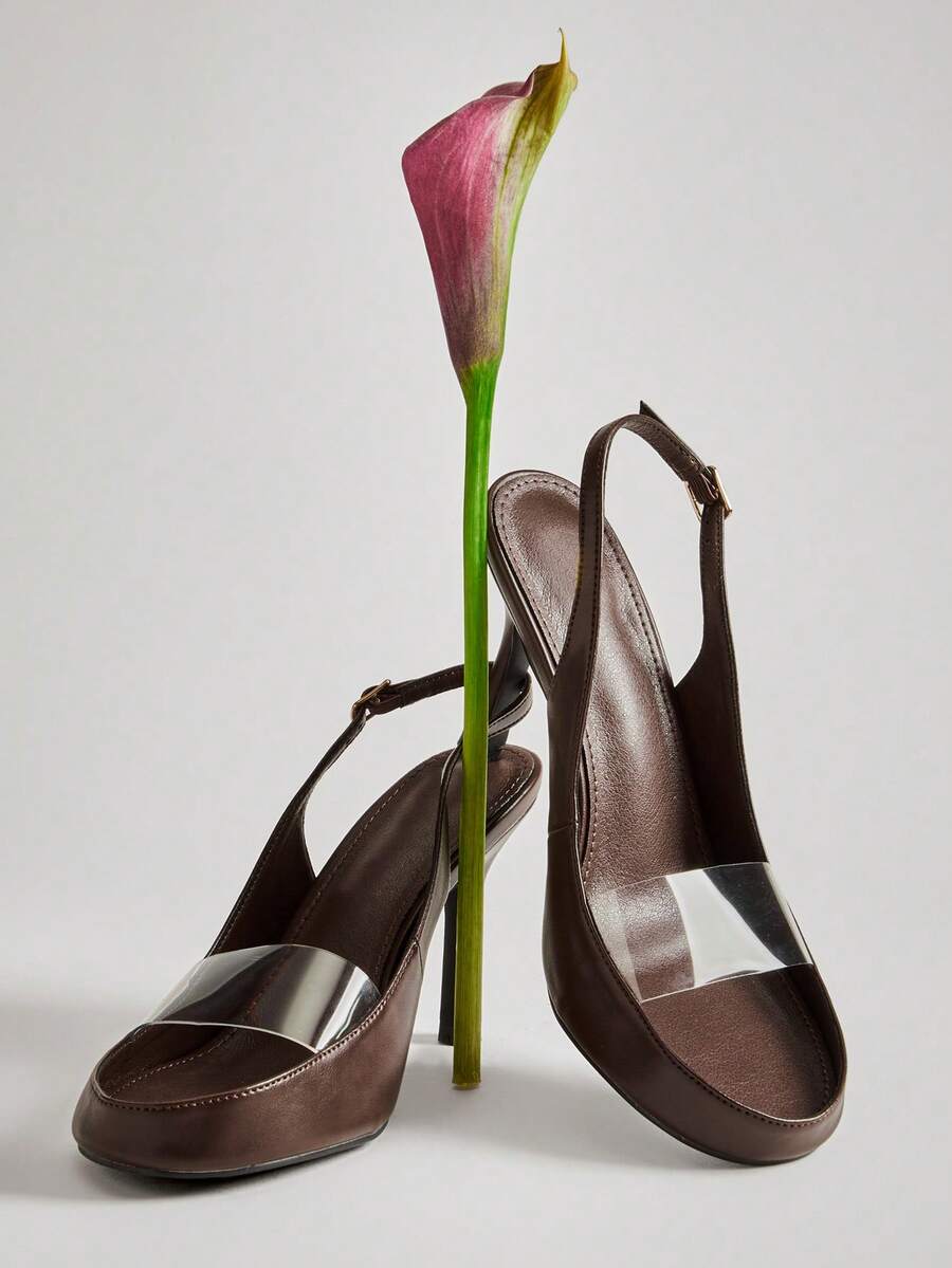 Pair of espresso brown transparent-vamp slingback stilettos
