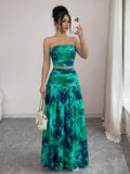 Styled view of floral strapless crop top and maxi skirt set showing visible color, print, and silhouette