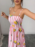 Side view of women's fruit print maxi dress with slim fit